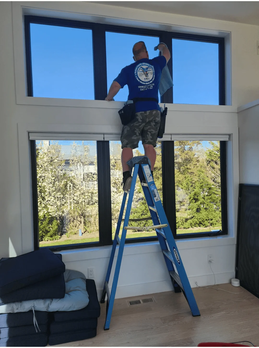 Professional residential window cleaning service in Long Island, New York cleaning home glass windows.